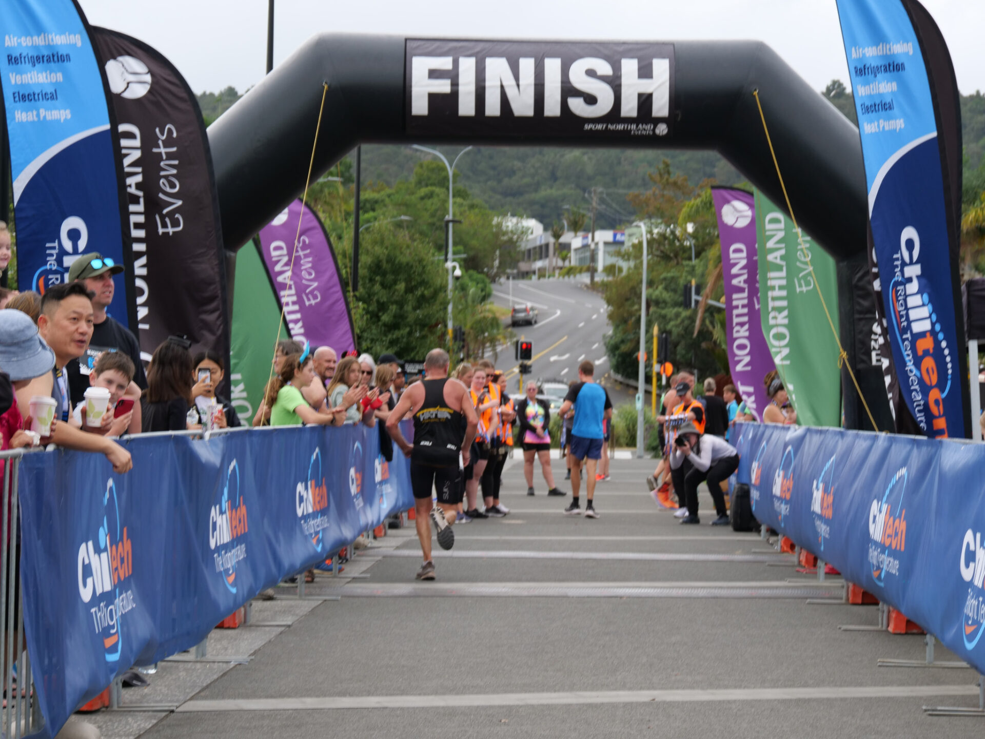 Man crosses finish line at Chilltech's Beach to Basin event